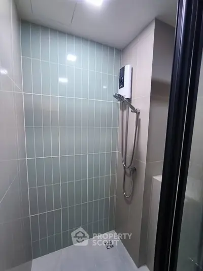 Modern bathroom with sleek shower design and contemporary tiles