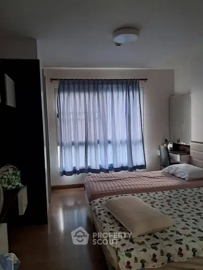 Cozy bedroom with soft lighting and elegant decor, perfect for relaxation.