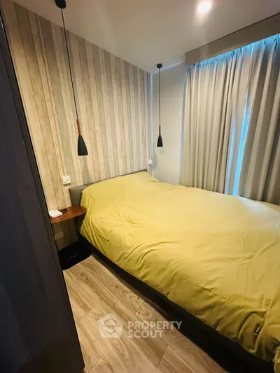 Cozy bedroom with modern lighting and stylish decor