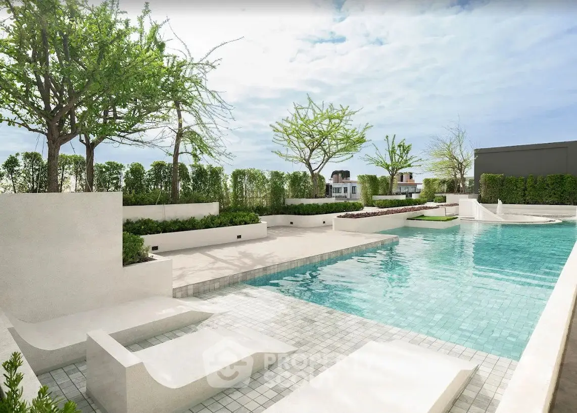 Luxurious modern pool area with sleek design and lush greenery, perfect for relaxation and leisure.