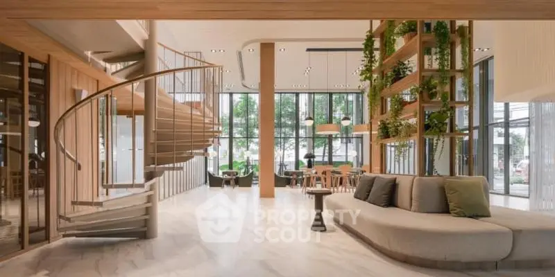 Luxurious modern living room with spiral staircase and greenery accents