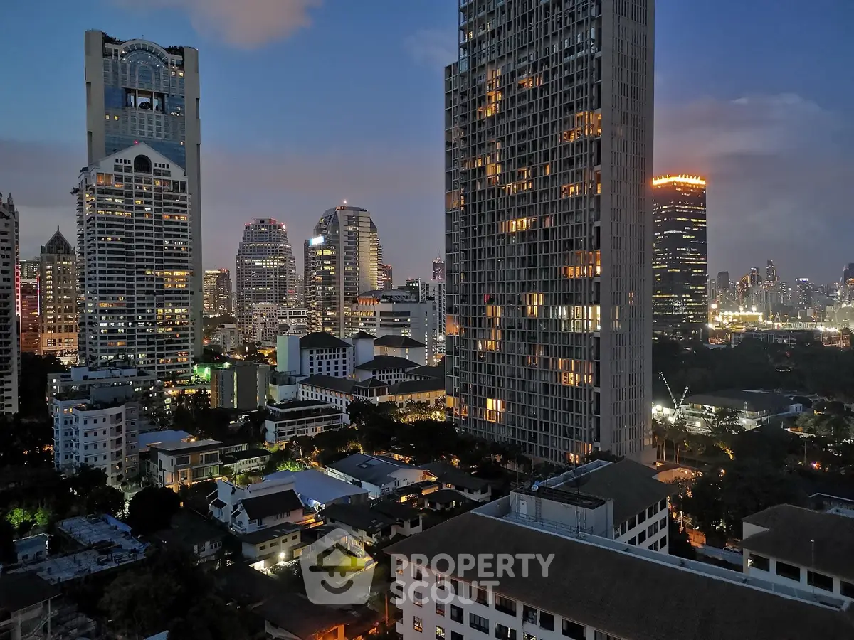 Stunning cityscape view with illuminated skyscrapers at dusk, showcasing urban living at its finest.