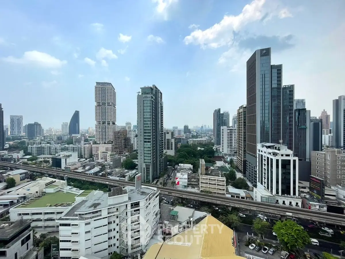 Stunning cityscape view with modern skyscrapers and lush greenery, perfect for urban living enthusiasts.