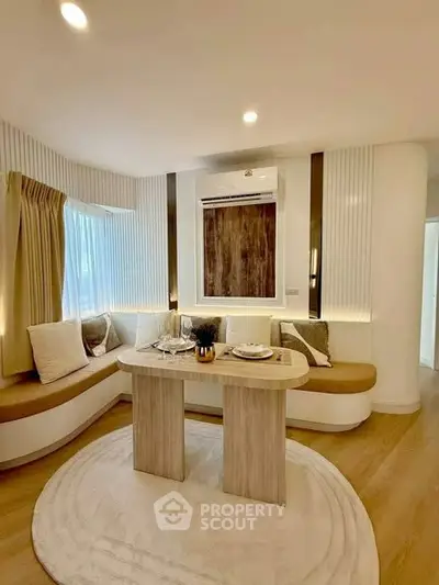 Modern living room with stylish seating and elegant decor