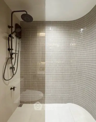Modern bathroom with stylish shower and elegant tile design