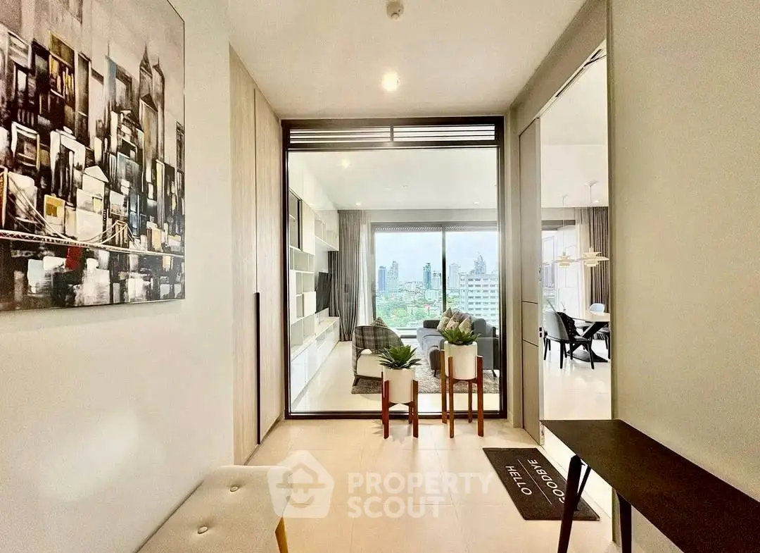 Modern open-plan living room with city view and stylish decor