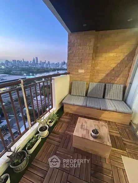 Charming balcony with city skyline view, cozy seating, and stylish wooden flooring.