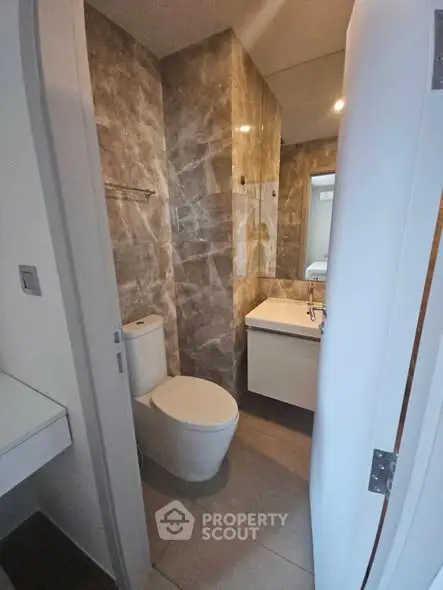 Modern bathroom with sleek design and elegant marble tiles