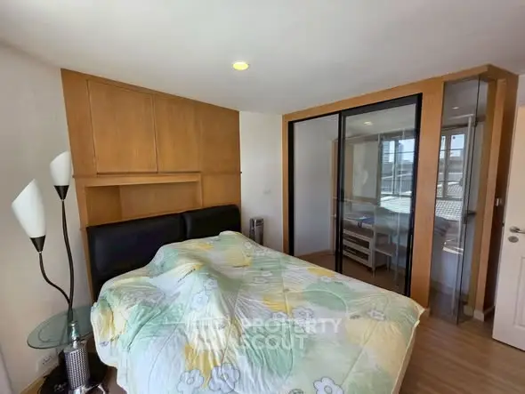 Cozy bedroom with modern design and ample natural light