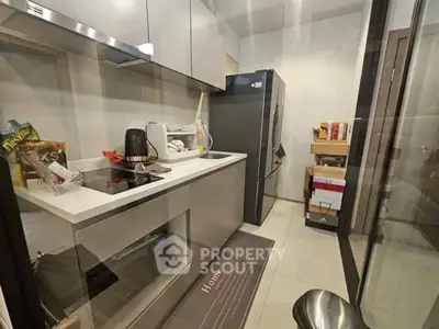 Modern kitchen with sleek appliances and minimalist design