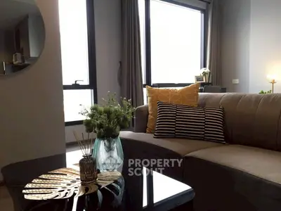 Stylish modern living room with cozy sofa and decorative pillows