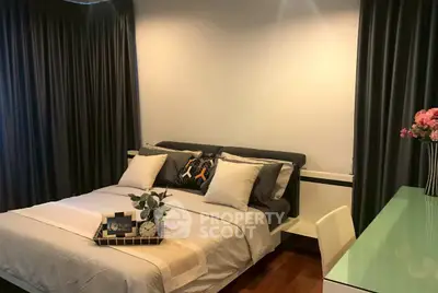 Cozy bedroom with elegant decor and stylish furnishings, perfect for relaxation and comfort.