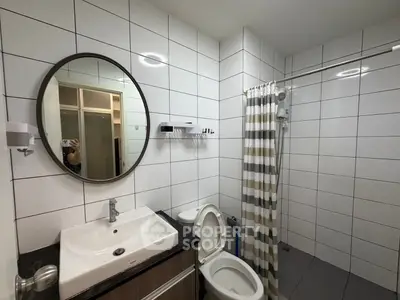 Modern bathroom with sleek fixtures and stylish tile design