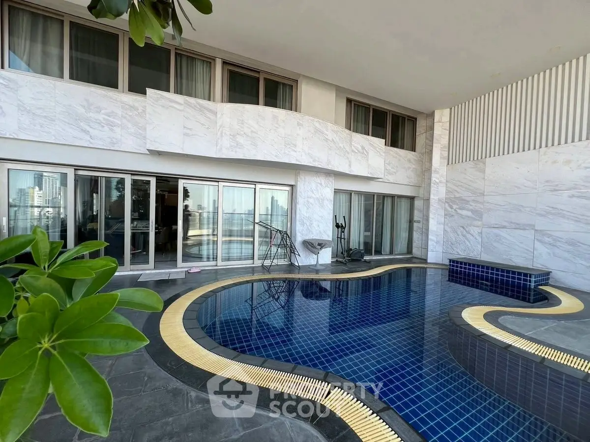 Luxurious private pool area with modern design and city view