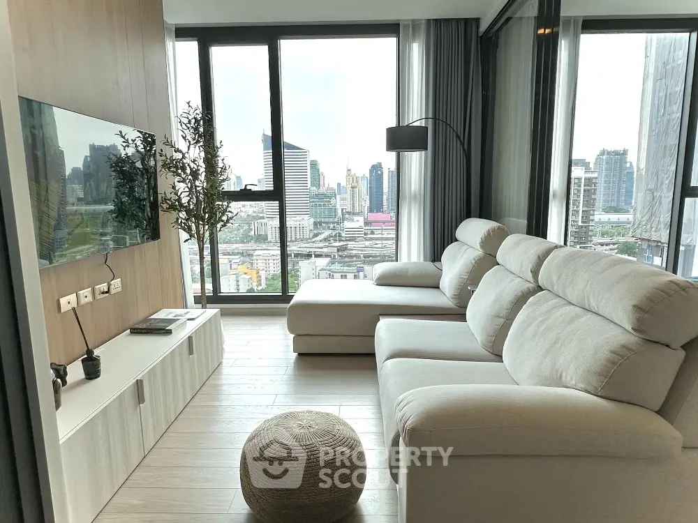 Modern living room with panoramic city view and stylish furniture