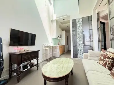 Modern living room with high ceiling and stylish decor