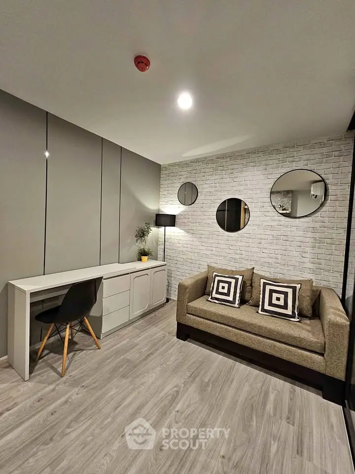 Modern living room with stylish decor and comfortable seating in a contemporary apartment.