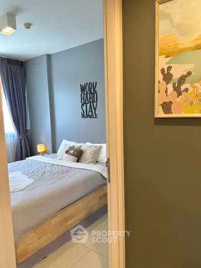 Cozy bedroom with modern decor and motivational wall art