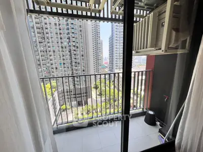 Modern urban balcony with cityscape view, perfect for relaxation and enjoying the skyline.