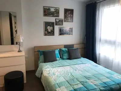 Cozy bedroom with stylish decor and natural light