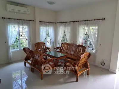 Charming living room with elegant wooden furniture and natural light