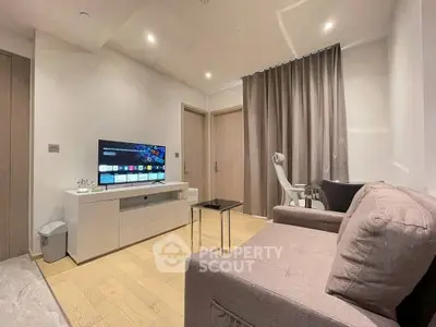 Modern living room with sleek furniture and smart TV setup