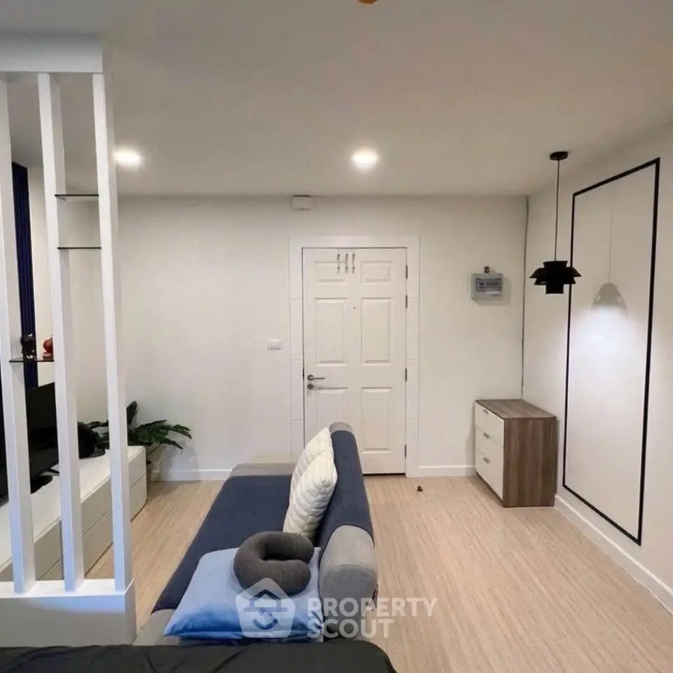 Modern living room with stylish decor and cozy seating area