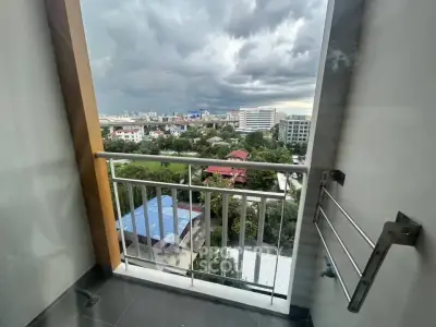 Stunning cityscape view from a modern high-rise balcony, perfect for urban living.