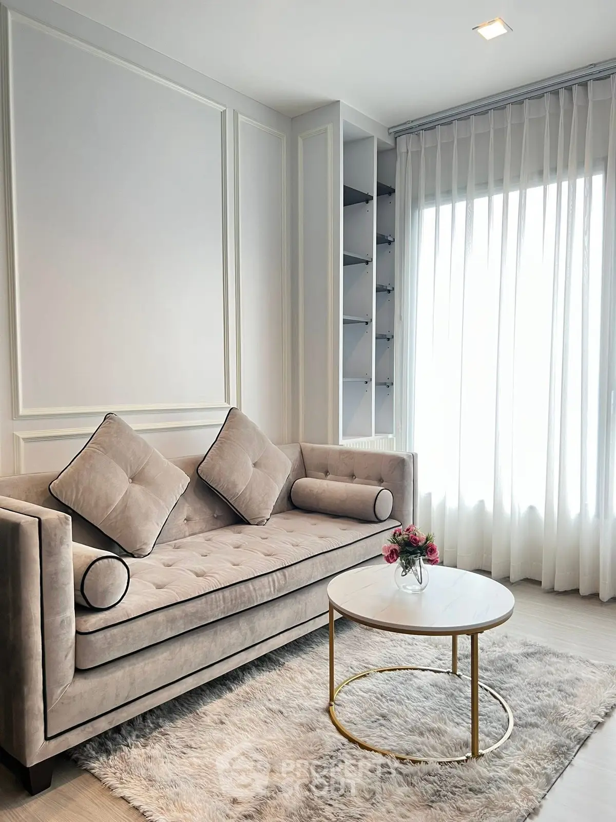 Elegant living room with plush sofa and chic decor