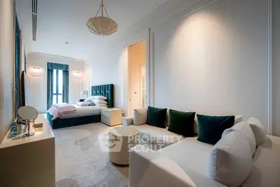 Luxurious bedroom with elegant decor and plush furnishings in a modern apartment.