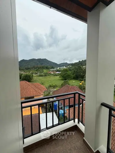 Charming balcony with stunning mountain views, perfect for relaxation and enjoying nature's beauty.