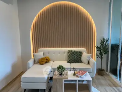 Modern living room with stylish lighting and cozy seating area