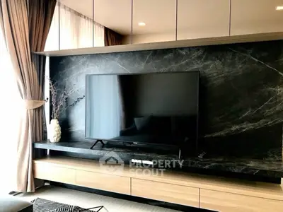 Modern living room with sleek TV setup and elegant decor