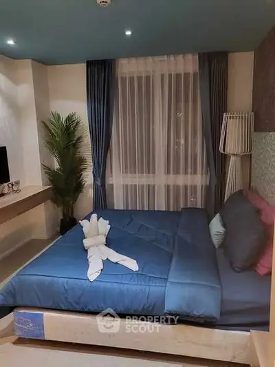 Modern bedroom with stylish decor and cozy ambiance