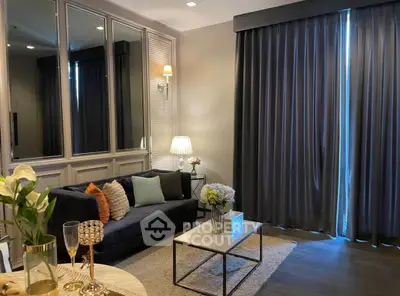 Elegant living room with plush sofa, chic decor, and ambient lighting