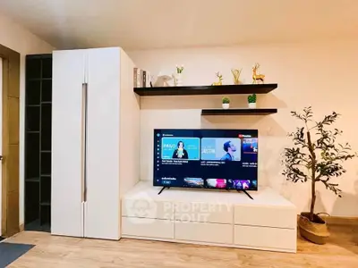 Modern living room with sleek TV unit and stylish decor