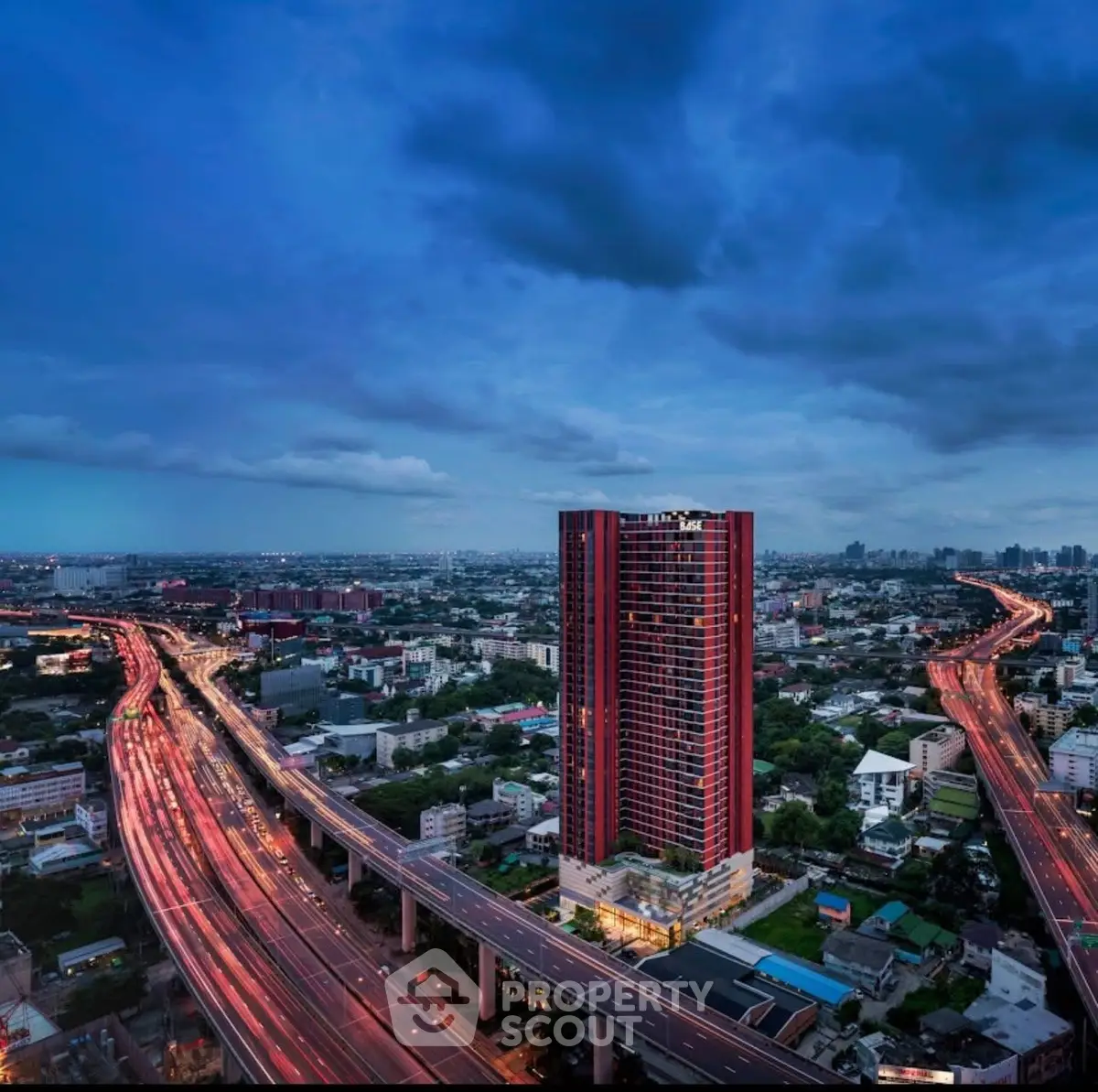 Stunning high-rise building with panoramic city views at dusk