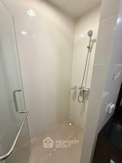 Modern bathroom with sleek shower design and glass door enclosure