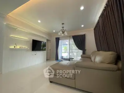 Spacious living room with modern decor and large sectional sofa