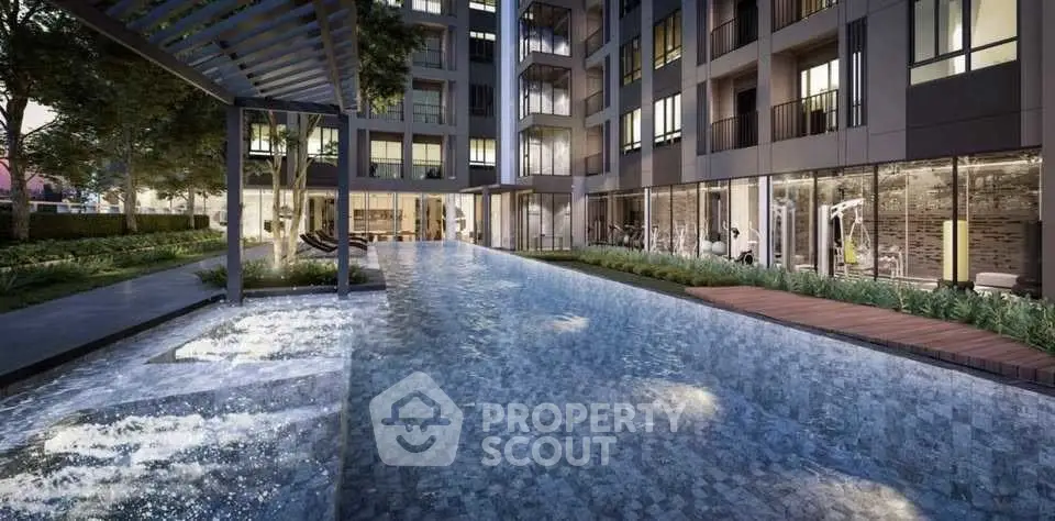 Luxurious modern apartment complex with stunning pool and gym facilities.