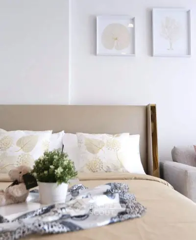 Cozy bedroom with elegant decor and plush bedding, perfect for relaxation.