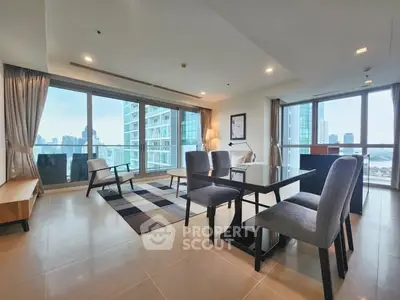 Spacious modern living room with city view and elegant furniture