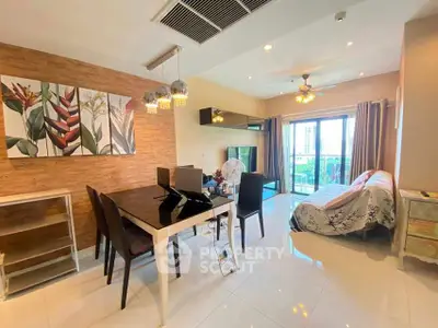 Modern living room with elegant dining area and balcony view