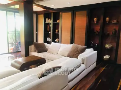 Luxurious living room with elegant decor and plush sofas, perfect for relaxation and entertaining.