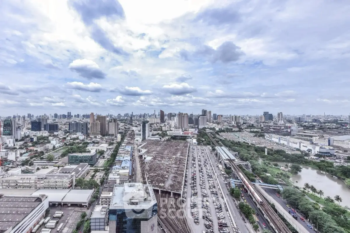 Stunning cityscape view from high-rise building showcasing urban skyline and expansive horizon.
