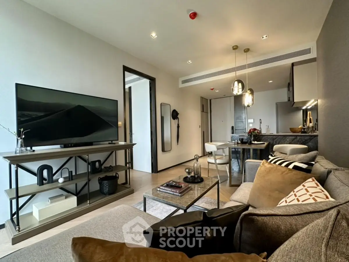 Modern living room with stylish decor and open kitchen layout