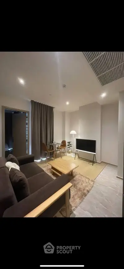 Modern living room with cozy seating and stylish decor