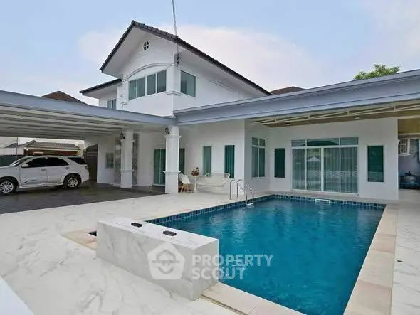 Luxurious modern home with private swimming pool and spacious carport