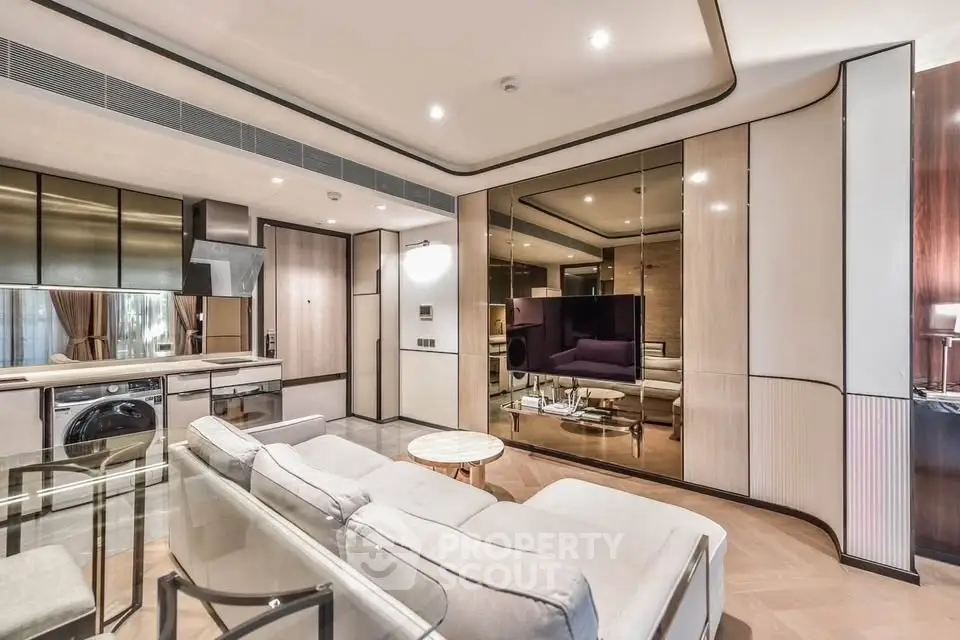 Luxurious modern living room with open kitchen and sleek design