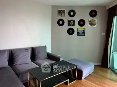 Stylish living room with modern decor and vinyl record wall art